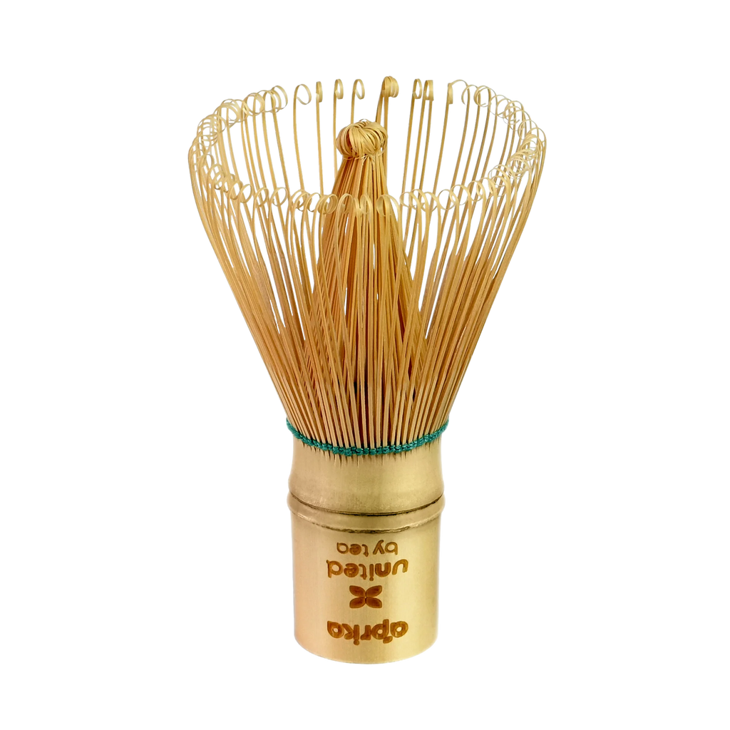 The eco-friendly Bamboo Matcha Whisk (100 Prongs) with a carved handle is perfect for traditional Japanese tea ceremonies, set against a pristine white background.