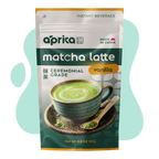A package of Ceremonial Grade Matcha Latte Powder Mix with Natural Vanilla Flavor, featuring a vibrant green latte in a ceramic cup on the front.