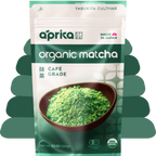 A green and white package of organic Japanese Matcha Green Tea Powder, featuring a bowl of café-grade matcha on the front.