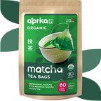 A box of Japanese Matcha Green Tea Bags with a green bowl of ceremonial-grade matcha and tea leaves in the background.