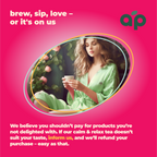 A woman wearing a green robe holds tea against a pink backdrop, symbolizing stress relief and better sleep. Calm and Relax Herbal Tea, 60 Bags, is a natural choice with a satisfaction guarantee.