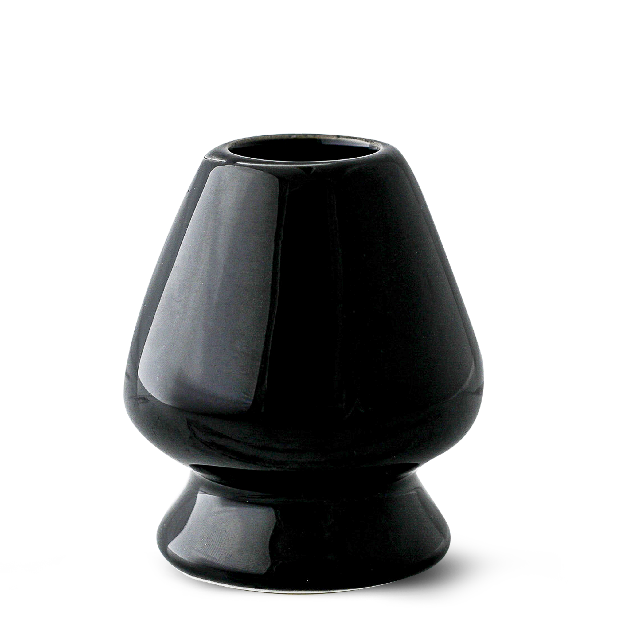 The Black Matcha Whisk Holder from the Black Matcha Whisk Holder and Bamboo Whisk Set exudes a Japanese aesthetic with its glossy ceramic finish, wide base, and narrow top, reminiscent of an elegant matcha whisk holder.