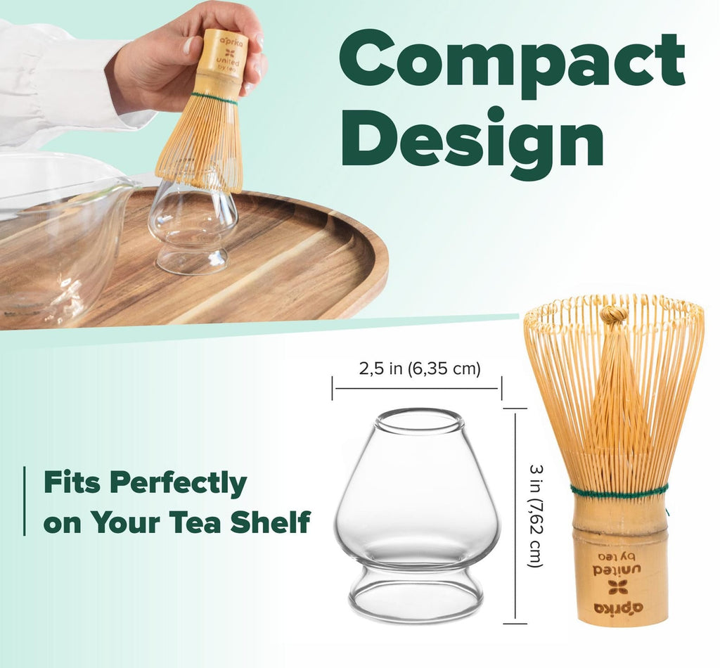 A hand places the bamboo whisk into the Clear Glass Matcha Whisk Holder; a diagram indicates the holder measures 2.5" wide by 3" tall, with design text shown.