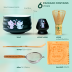 Experience the Black Unfurl Matcha Gift Set: includes a kawaii cat bowl, bamboo whisk, whisk holder, scoop, sifter, and orange tea cloth—everything for your perfect matcha moment.